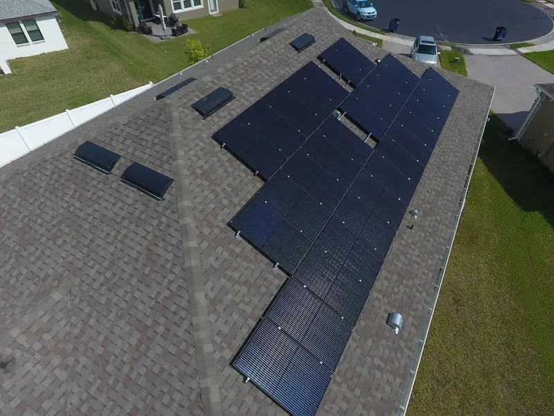 Solar panels following the lines of a hip roof, seen from above